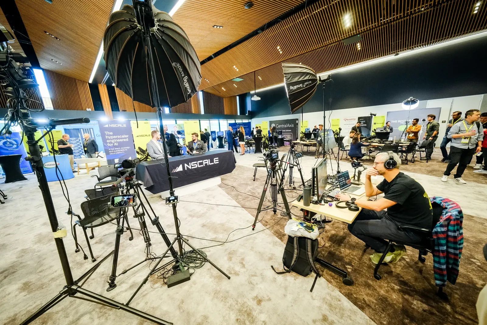 Wide view of cameras and lighting around a conference interview studio