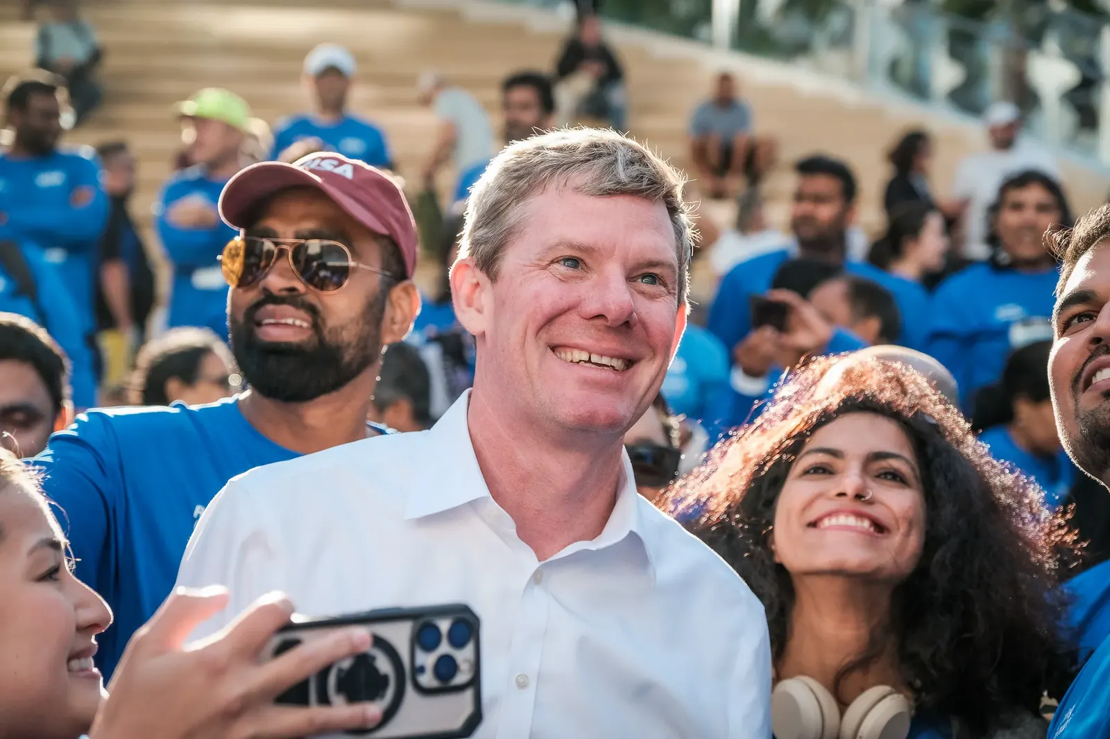 Event participants sharing a smiling moment outdoors